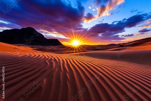 Sunset sky awe is showcased in a realistic photo of a vast desert landscape, where the setting sun paints the sky in rich purple and gold tones photo