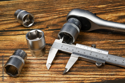 Vernier caliper and ratchet wrench