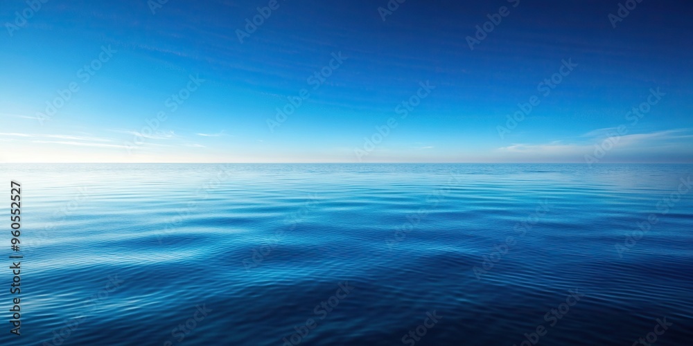 Obraz premium A beautiful and serene image of a gradient background showcasing the mesmerizing shades of ocean blue water from an eye level perspective, mesmerizing, background, blue, image, shades