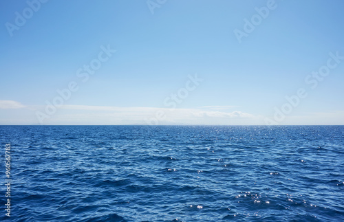 Seascape with horizon and clear sky, Pacific Ocean.