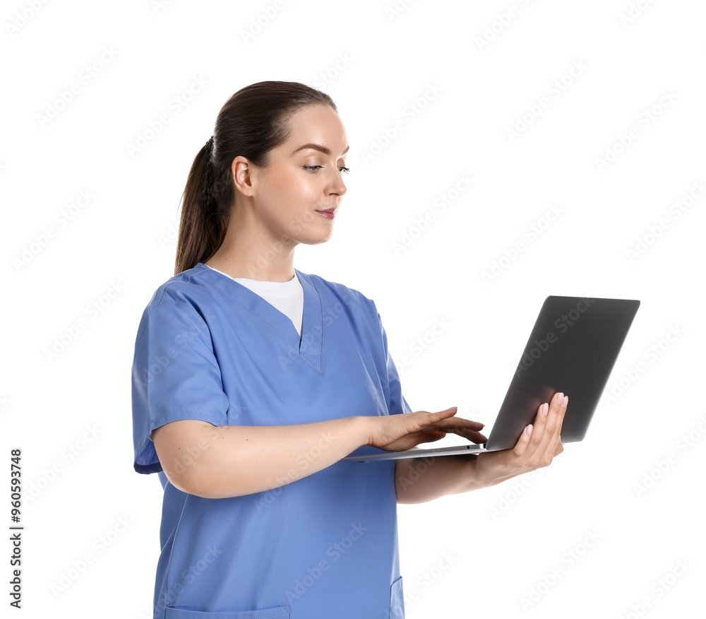 Professional nurse working with laptop on white background Professional nurse working with laptop on white background