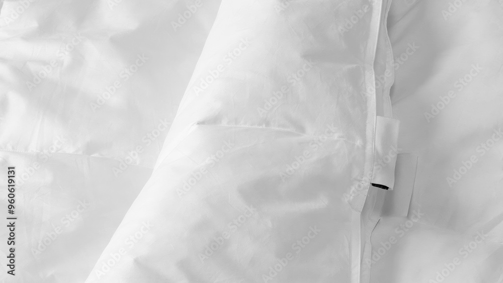 Closeup of duvets and bed sheets. Closeup of duvets and bed sheets.