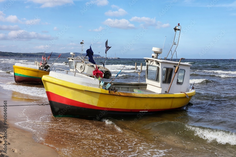 Two fishing boats on the shore of the Baltic Sea. Two fishing boats on the shore of the Baltic Sea.