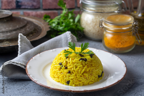 Turmeric Rice Pilaf. Rice made with turmeric and currants. Turkish name; Zerdecalli pirinc pilavi photo