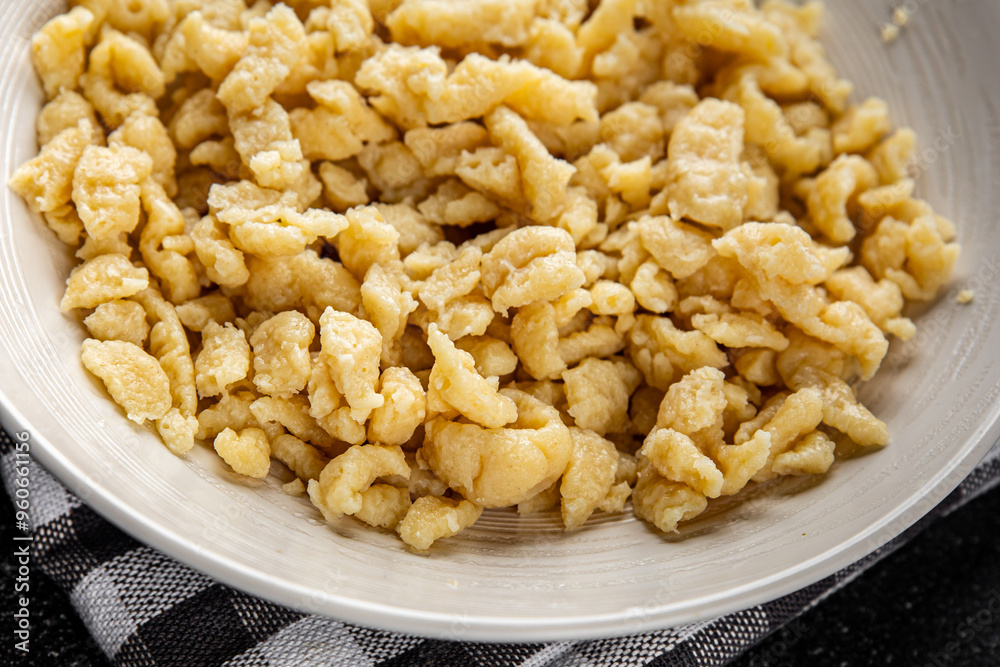 pasta spaetzle egg pasta irregular shape fresh meal food snack on the table copy space food background rustic top view pasta spaetzle egg pasta irregular shape fresh meal food snack on the table copy space food background rustic top view