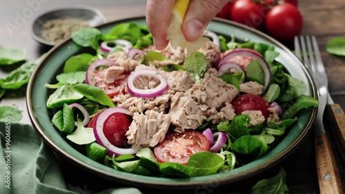 Wallpaper Mural Canned tuna salad with tomatoes lambs lettuce corn salad and onions, stock video 4k Torontodigital.ca