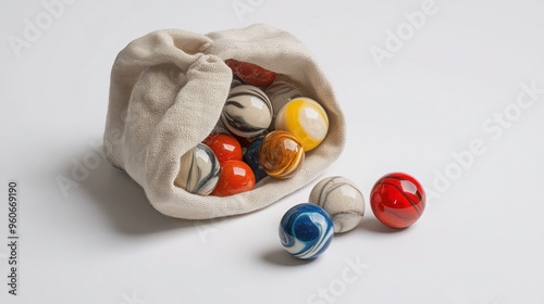 Close-up shot of classic marbles set in drawer - nostalgic game collection for all ages.