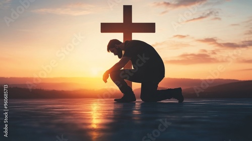 An outdoor silhouette of a man kneeling at sunset near a wooden Christian cross in a nature meadow grass field. Religion faith belief repentance prayer forgiveness hope in Jesus Christ, salvation.