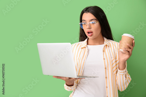 Shocked young female progra...