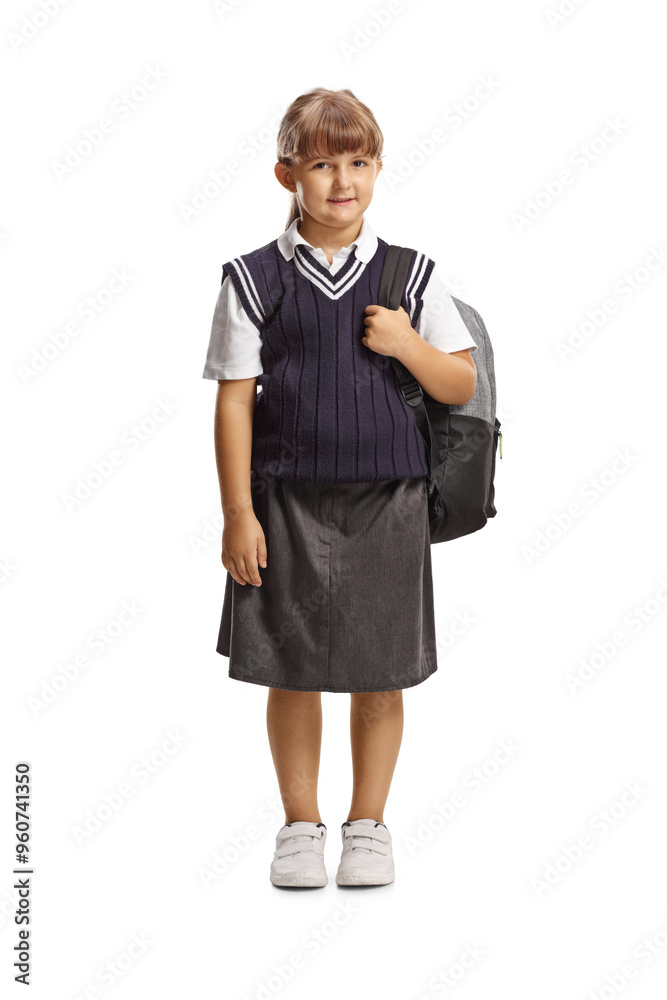 Schoolgirl in a uniform carrying a backpack Schoolgirl in a uniform carrying a backpack