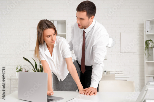 Business man molesting his ...