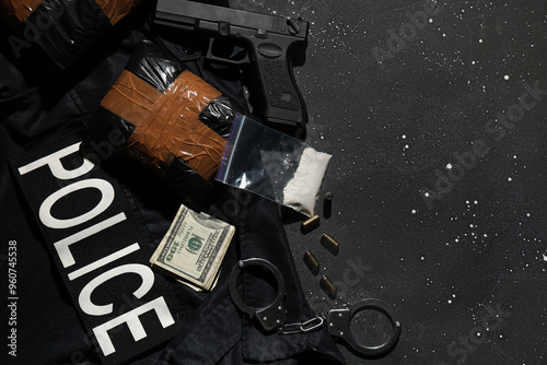Drug packages with gun, han...
