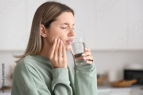 Young woman with glass of c...