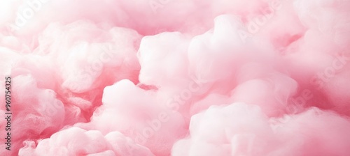 Pink pastel background with fluffy clouds.