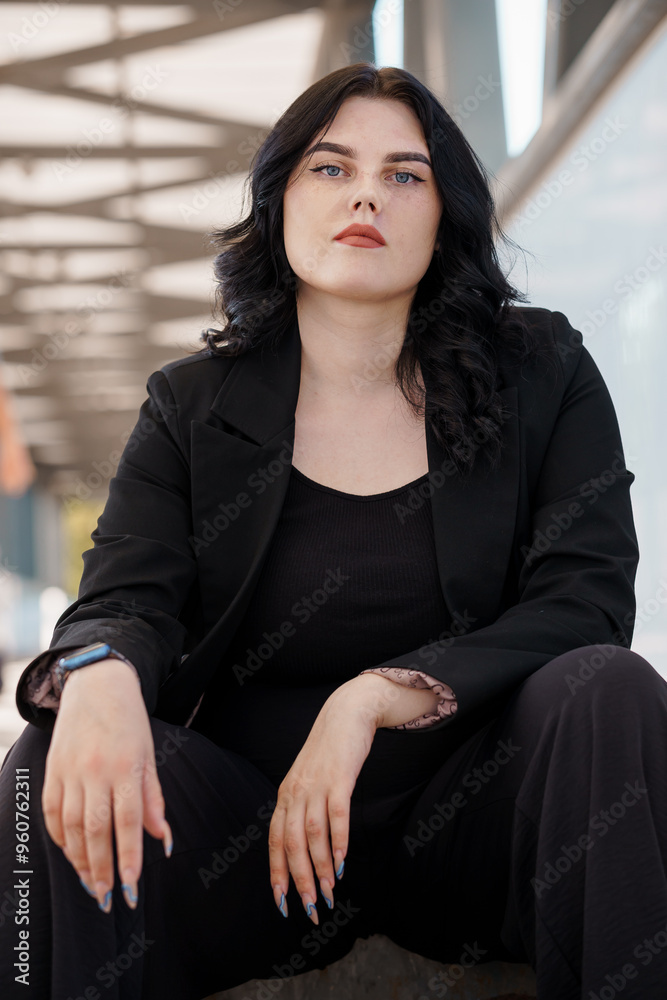 Confident Businesswoman in Modern Urban Setting Confident Businesswoman in Modern Urban Setting