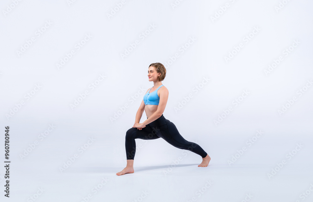 Obraz premium Full body length gaiety shot athletic and sporty woman doing healthy and meditative yoga exercise workout posture on isolated background. Healthy active and body care lifestyle
