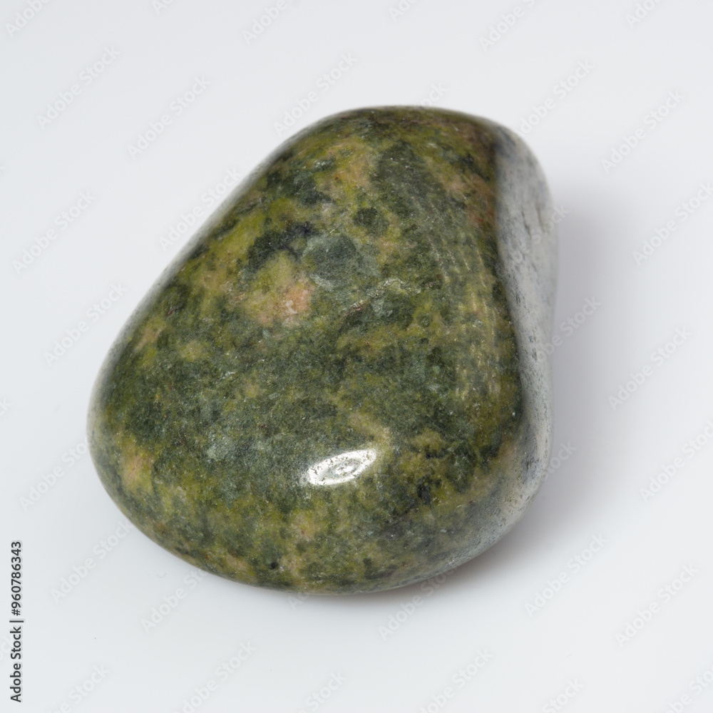 Exquisite Polished Serpentine Gemstone on Pristine White Background Exquisite Polished Serpentine Gemstone on Pristine White Background