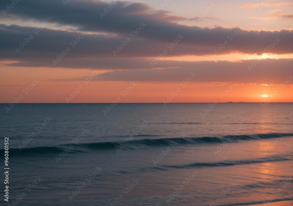 Obraz premium Sunset Over Calm Ocean Waves