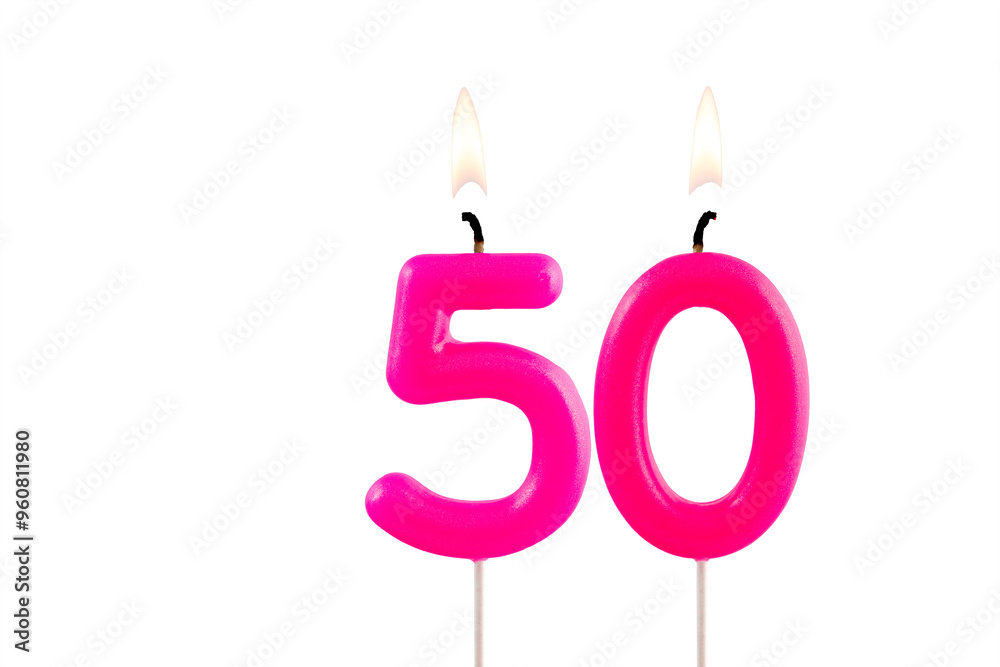 Pink number 50 birthday candle on white background Pink number 50 birthday candle on white background