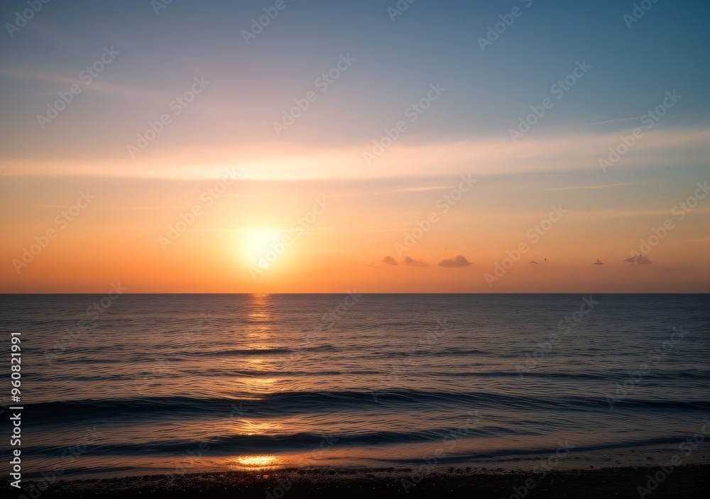 Obraz premium Sunset Over Calm Ocean Waves