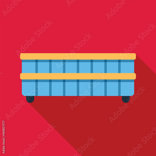 Blue wooden crate with wheels standing on red background, side view with long shadow