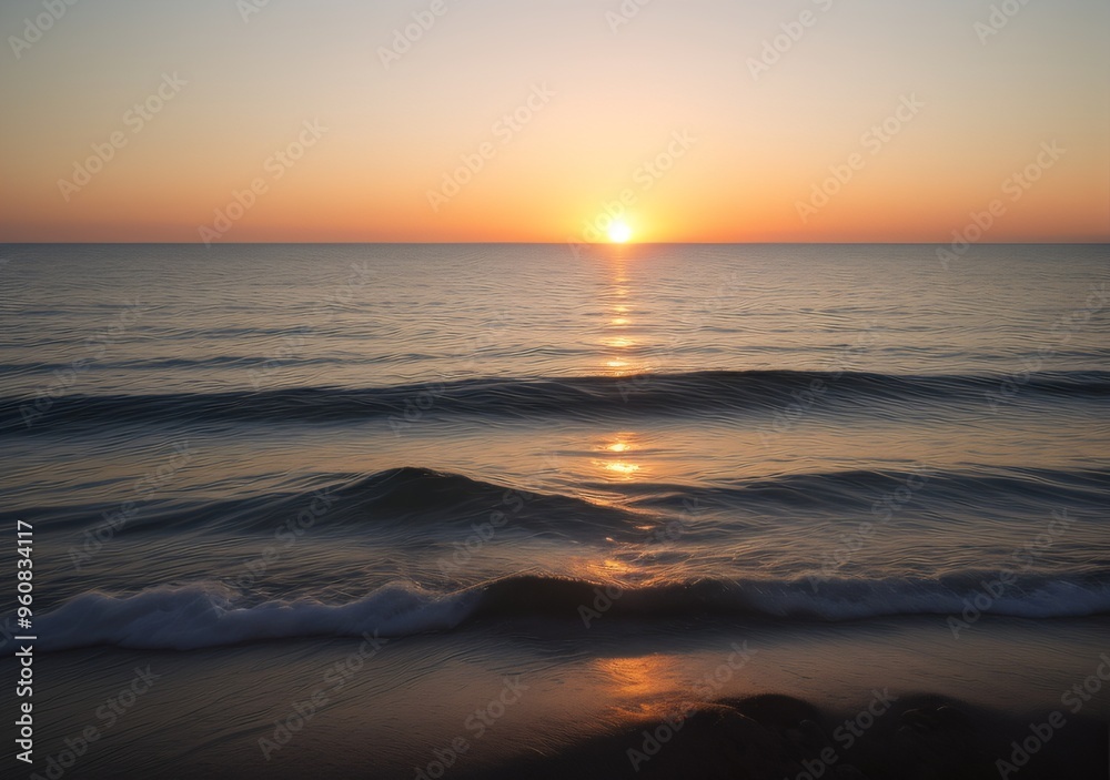 Fototapeta premium Sunset Over Calm Ocean Waves
