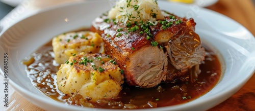 Classic Dish Tender And Juicy Pork Loin Roast With Gravy Sauerkraut And Bread Dumpling photo