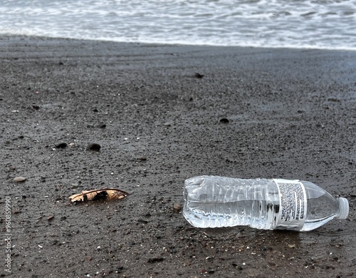 Plastic water bottle discarded along the beach