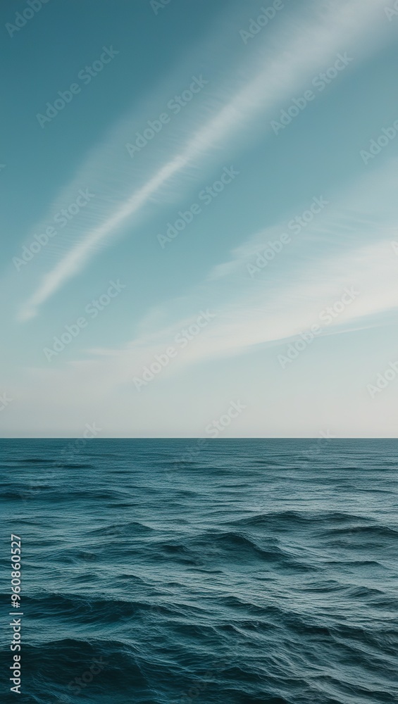 The vast ocean stretches out under a clear blue sky with wispy clouds, phone background wallpaper, ai generated