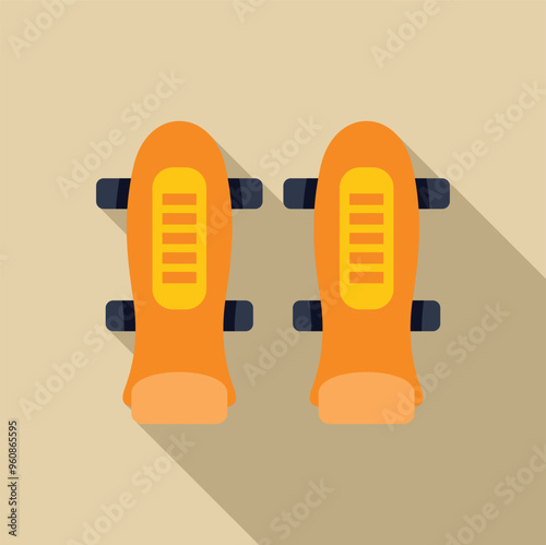 Pair of orange knee pads providing safety and protection during sports activities, flat lay with long shadow