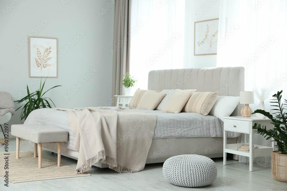 Fototapeta premium Big comfortable bed in room. Interior design