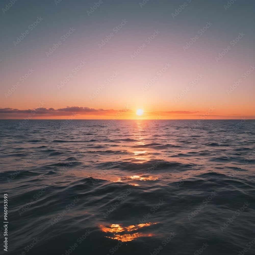 Obraz premium Ethereal Sunset Over Calm Ocean Waters