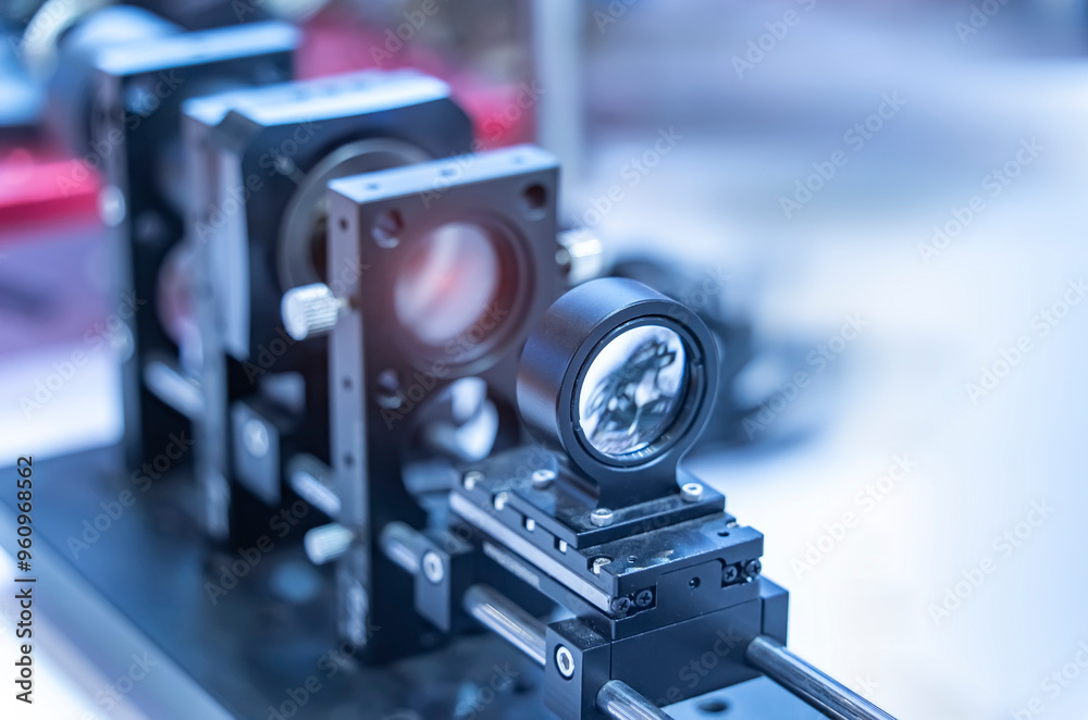 Experiment with laser device in optical laboratory Experiment with laser device in optical laboratory