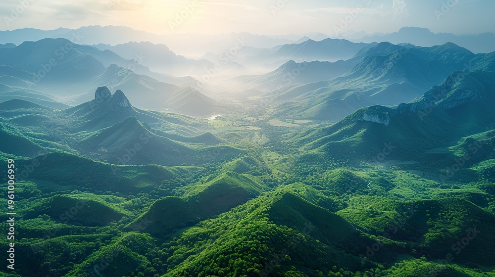 A breathtaking panorama of rolling green hills and mountains bathed in the soft light of sunrise. The mist clings to the valleys, adding an ethereal quality to the scene. A breathtaking panorama of rolling green hills and mountains bathed in the soft light of sunrise. The mist clings to the valleys, adding an ethereal quality to the scene.