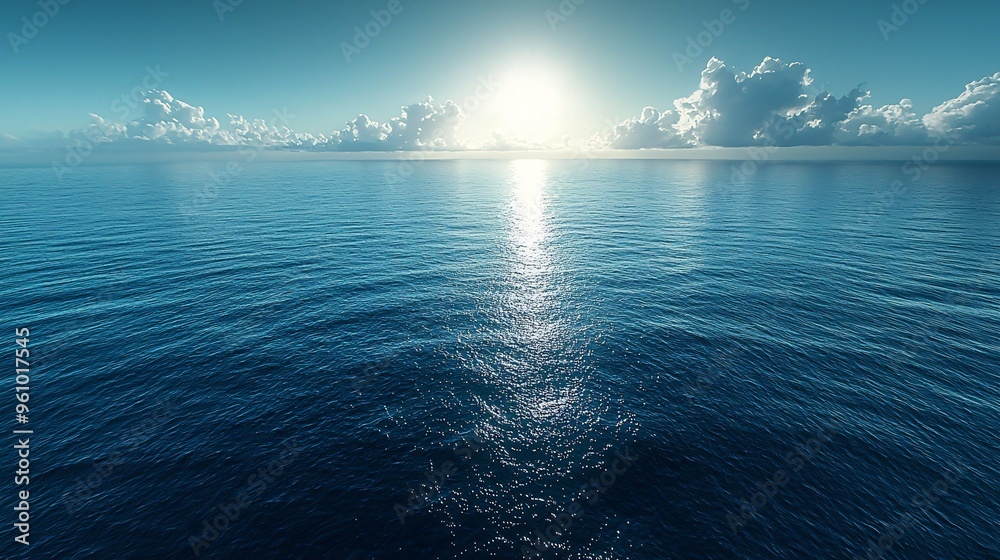 Fototapeta premium Clear skies above and calm seas below, as four turbines generate electricity.