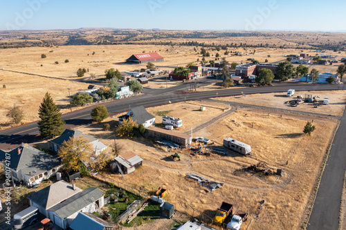 Aerial drone view of the famous ghost town Shaniko in Central Oregon, with abandoned buildings, church and historical shops, hotels etc. High quality picture for download photo