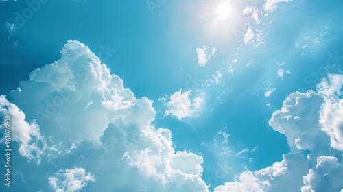 Fototapeta Naklejka Na Ścianę i Meble -  75. Sunny sky with serene white clouds, offering a clear and fresh background for web ads and banners, with designated space for text