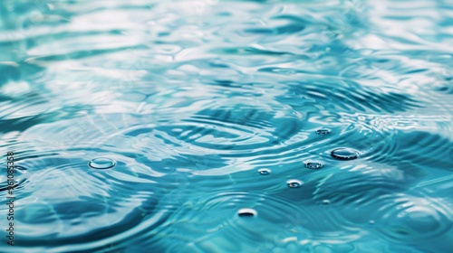 230. Peaceful spa concept background featuring a calming blue water surface with subtle rings and ripples, ideal for creating a serene, renewing environment