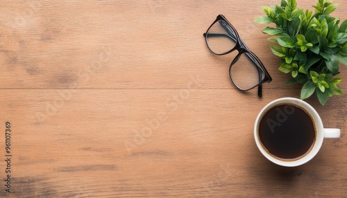 Top View of Wooden Desk with Coffee and Glasses