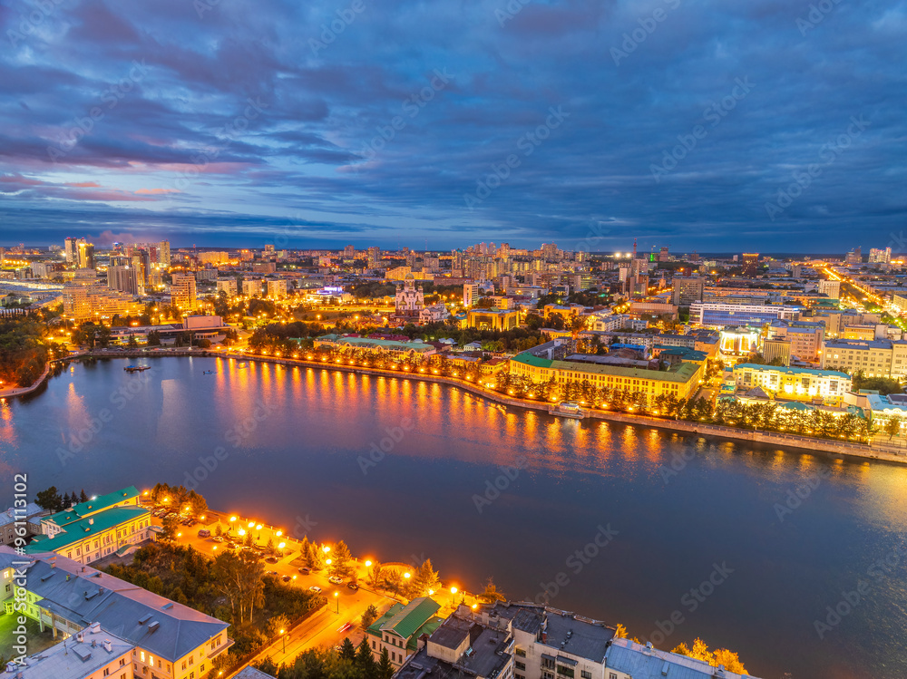 Fototapeta premium Embankment of the central pond and Plotinka in Yekaterinburg at summer or early autumn night. The historic center of the city of Yekaterinburg, Russia, Aerial View