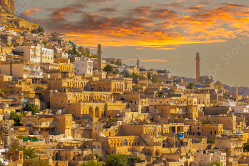 Ancient and stone houses of Old Mardin (Eski Mardin) with Mardin Castle, Located South Eastern of Turkey photo