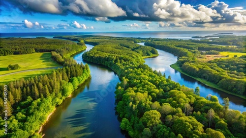 Aerial View Of Tranquil River Meandering Through Lush Coastal Forest, Capturing The Serene Beauty Of The County'S Waterways. photo