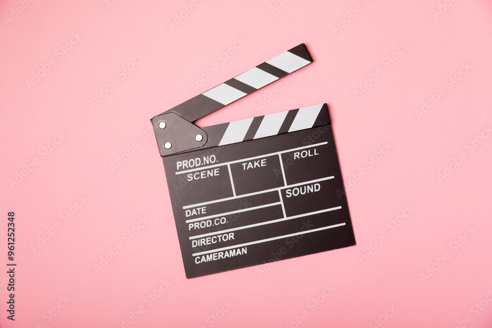 Naklejka premium Movie clapper. Movie clapperboard on a bright colored background. Concept of rest and entertainment. Concept of cinema. Film director. Producer. Business and profession. Place for text. Copy space