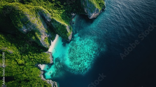 A beautiful island with a blue ocean and green mountains