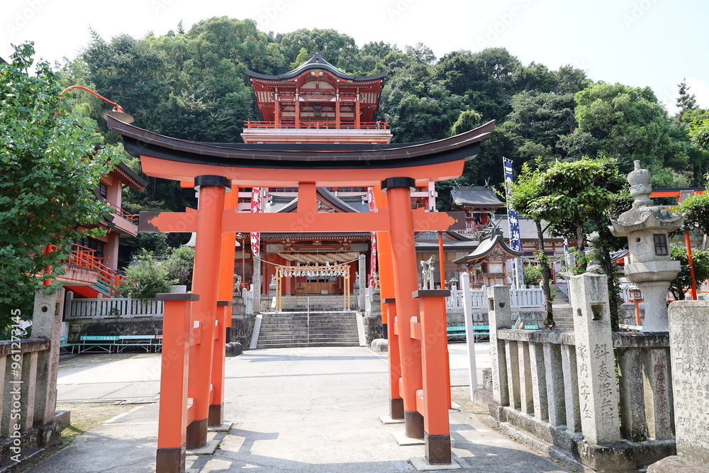 A Japanese shrine: : a scene of the entrance torii to the precincts of Kusado-inari-jinjya in Fukuyamka City in Hiroshima Prefecture. A Japanese shrine: : a scene of the entrance torii to the precincts of Kusado-inari-jinjya in Fukuyamka City in Hiroshima Prefecture.