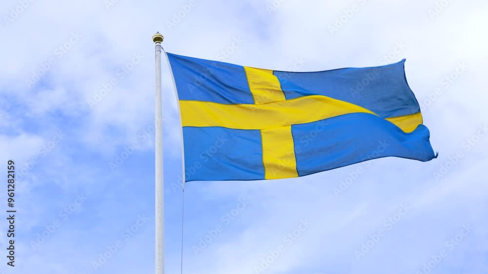 National flag of Sweden waving in wind in slow motion