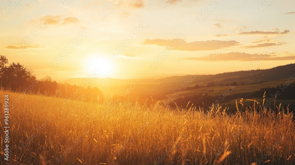 A clear sky during sunset, with a warm golden glow spreading across a tranquil landscape. A clear sky during sunset, with a warm golden glow spreading across a tranquil landscape.