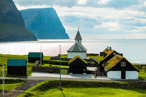 Church of Vidareidi overlooking a fjord, Faroe Islands