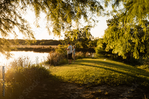 Father And Son Fish Together In Rural Oklahoma photo