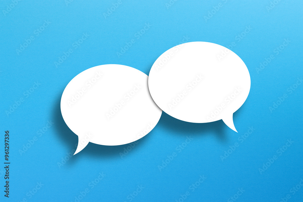 Blank white speech bubbles on blue background Blank white speech bubbles on blue background